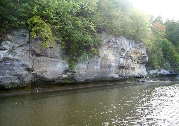Sandstone ledge of Hanging Rock rising above the Middle Raccoon River just southwest of Redfield